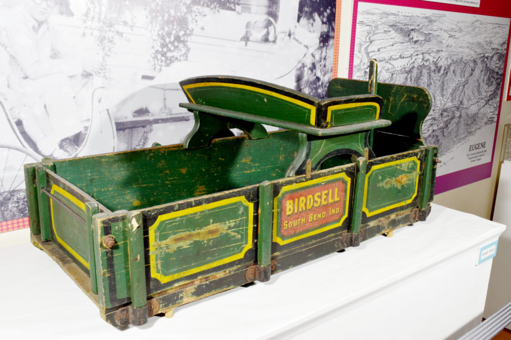 A goat-pulled cart on display